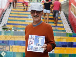 Gilberto Rabelo, a 74-year-old street vendor, poses at the "Escadaria Selaron"...