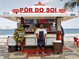 Dayvison Nascimento, a 25-years-old bartender, poses for a portrait at the...