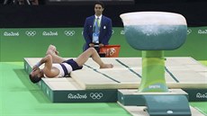 Dsivé zranní Samira Ait Saida na peskoku v kvalifikaci olympijského víceboje...