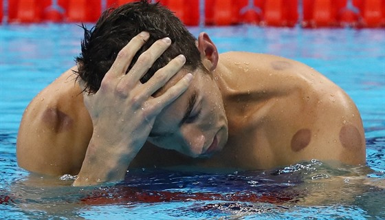 Michael Phelps prov svou druhou olympijskou zlatou bhem ternho veera....