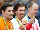 OLYMPIJSKÝ VÍTZ. Fabian Cancellara (uprosted) slaví druhé olympijské zlato v...