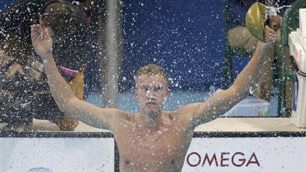 Kazask plavec Dmitrij Balandin slav olympijsk zlato na 200 metr prsa.