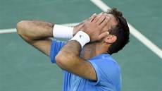 Argentinský tenista Juan Martin del Potro se raduje ze semifinálové poráky...