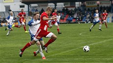 Momentka z duelu druhého kola domácího poháru mezi Polnou a Olomoucí (ervená)