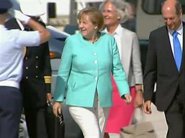Angela Merkelová po přistání v Itálii, kde budou lídři třech největších zemí EU...