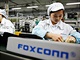 Pracovnice montn linky spolenosti Foxconn