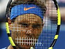 panlský tenista Rafael Nadal se trápí v utkání s Pouillem na US Open.