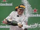 TRADINÍ SPRCHA AMPASKÝM. Nico Rosberg se raduje z vítzství ve Velké cen...