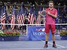 výcarský tenista Stan Wawrinka pózuje s trofejí pro vítze US Open.