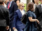 Demokratická prezidentská kandidátka Hillary Clintonová pichází na nedlní...