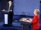 Republican U.S. presidential nominee Trump listens as Democratic U.S....