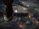 Mezinárodní kosmická stanice piblin 402 kilometr nad bouemi. Ta bílá...