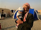 Uprchlíci z Mosulu u msta Kajára (26. íjna 2016)