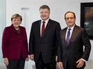 Nmecká kancléka Angela Merkelová, ukrajinský prezident Petro Poroenko a...