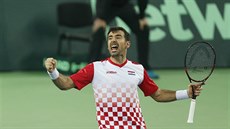 Ivan Dodig se raduje bhem tyhry ve finále Davis Cupu proti Argentin.