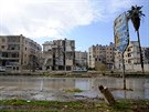 Domy poniené ostelováním v jedné ze tvrtí východního Aleppa dobyté v...