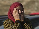 Syrtí uprchlíci u pechodu Cilvegozu na syrsko-turecké hranici (19. prosince...