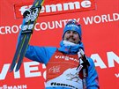 Ruský bec na lyích Sergej Usugov slaví triumf na Tour de Ski.