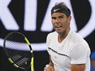 panlský tenista Rafael Nadal slaví zisk tetího setu proti Dimitrovovi v...