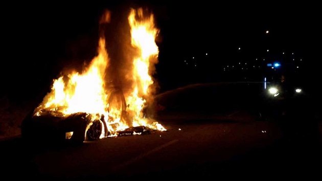 Por vozu Porche Panamera na dlnici u Olomouce. Hoet zaalo v nedli veer. (22. ledna 2017)