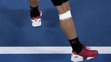 výcarský tenista Stan Wawrinka si nechal obvázat koleno v semifinále...
