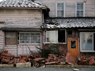 Pokozené domy ve mst Namie nedaleko elektrárny Fukuima. (1. bezna 2017)