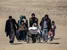Lidé, kteí uprchli ped boji o západní Mosul (26. února 2017)