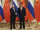 Setkání ruského a ínského prezidenta na summitu v Pekingu. (14.5.2017)