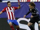 Koke (Atlético Madrid) versus Luka Modri, záloník Realu, v odvet semifinále...