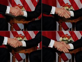 Fotograife zachycujc podn ruky mezi Donaldem Trumpem (vlevo) a Emmanuelem...