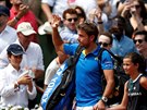 Stan Wawrinka mává divákm.