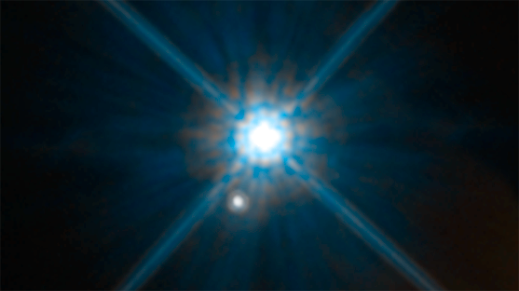 Pohled na bílého trpaslíka Stein 2051 B a pět tisíc světelných hvězd vzdálenou...