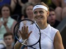 ZVLÁDLA JSEM TO. Lucie afáová slaví postup do druhého kola Wimbledonu.