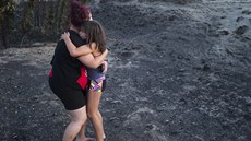 Poáry v Kanad spálily na popel domovy tisíc lidí. ena s malou dcerou na...