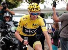 NA ZDRAVÍ. Chris Froome slaví svj tvrtý titul na Tour de France bhem...