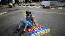 Protivládní demonstranti v Caracasu během voleb do Ústavodárného shromáždění...