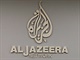 Logo stanice al-Dazíra v její jeruzalémské kancelái (13. ervna 2017)
