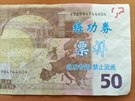 Falen bankovka s asijskmi znaky, kterou pinesl mu do smnrny v Hradci...