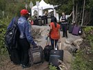Kanada zizuje u hranic s USA uprchlický tábor peván pro haitské rodiny....