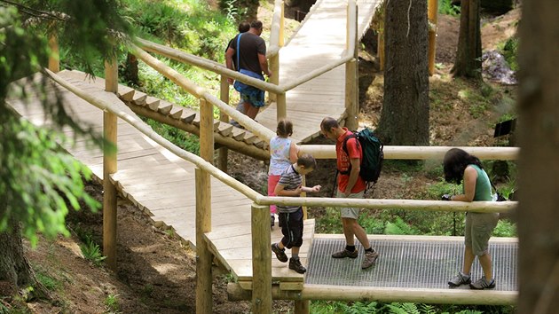 Turist u pramene Vltavy na umav