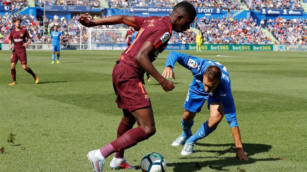 Momentka z duelu Getafe (modr) vs. Barcelona