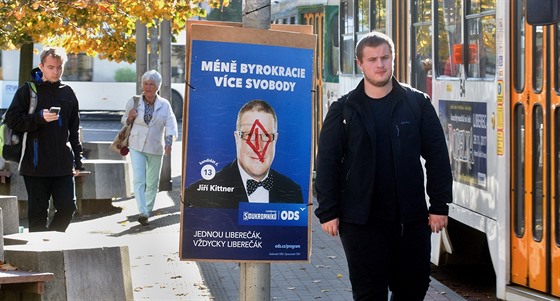 Poškozený plakát Jiřího Kittnera.