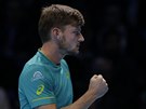 David Goffin slaví úspnou akci ve finále Turnaje mistr.