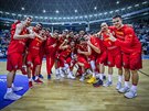panltí basketbalisté oslavují kvalifikaní vítzství nad Slovinskem.