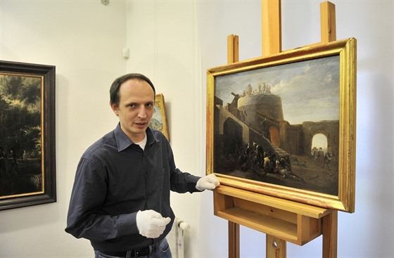 Kurátor výstavy Aleš Veselý u slavného obrazu od Pietera van Laera, který se...