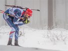 eský biatlonista Tomá Krupík svití po trati tafetového závodu v Oberhofu.