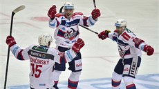 Marek Trončinský (vlevo) a Petr Sýkora (uprostřed) oslavují gól kapitána...