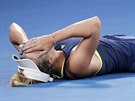 POÁD NEMَU UVIT. Caroline Wozniacká po triumfu na Australian Open.