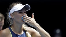 Dánská tenistka Caroline Wozniacká slaví postup do osmifinále Australian Open.