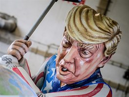 Alegorický vz s karikaturou zobrazující Donalda Trump niícího Paískou...